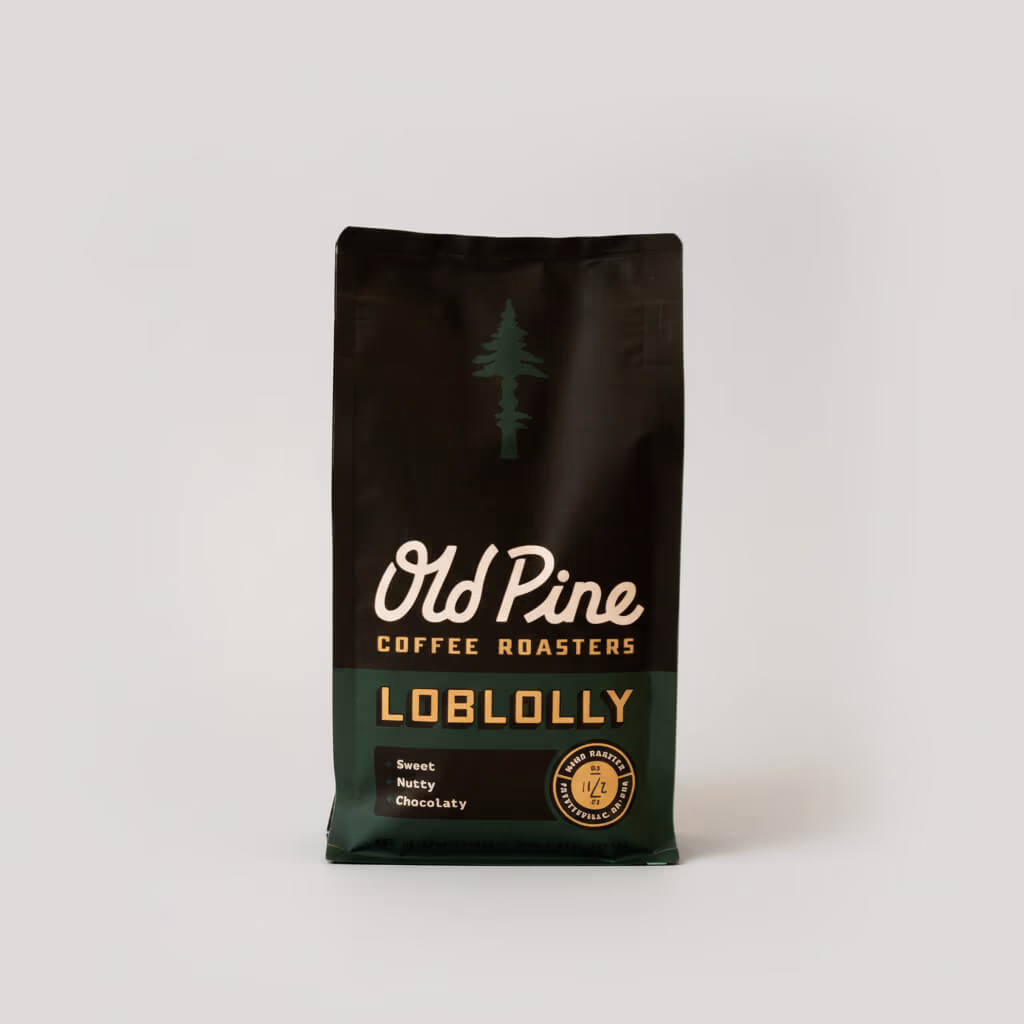 Old Pine Coffee Roasters Loblolly coffee bag, dark green packaging with a pine tree logo